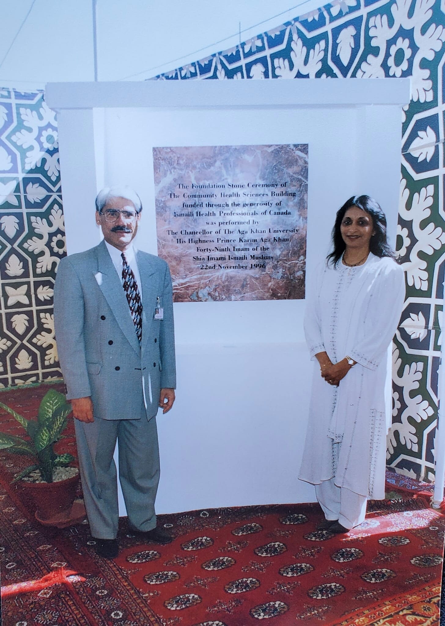 Dr. Abdulla and Almas beside the foundation stone of the Community Health Sciences Building at Aga Khan University, 22 November 1996