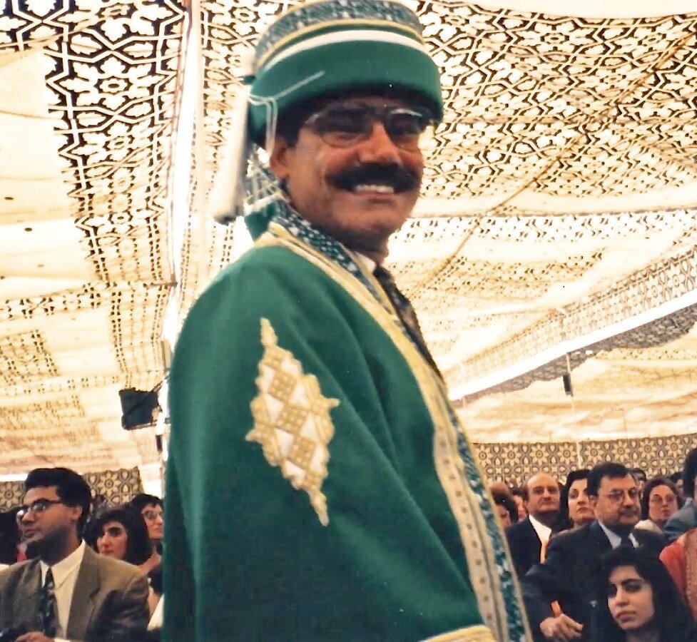Dr. Abdulla in academic convocation regalia as a member of the Aga Khan University faculty