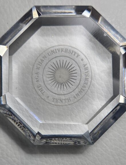 Crystal paperweight marking the Aga Khan University's Tenth Anniversary