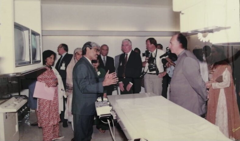 Dr. Abdulla explaining the new program and its equipment to His Highness the Aga Khan, including the first patient's angiogram
