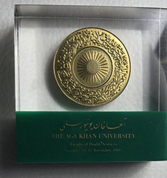 Commemorative medallion marking the founding of the Aga Khan University Faculty of Health Sciences, inaugurated 11 November 1985