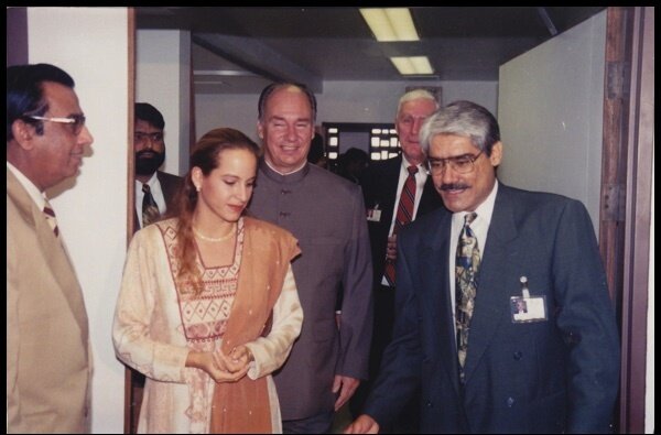 Dr. Abdulla and Princess Zahra Aga Khan walking into the Cardiac Catheterization Lab, with His Highness the Aga Khan following behind