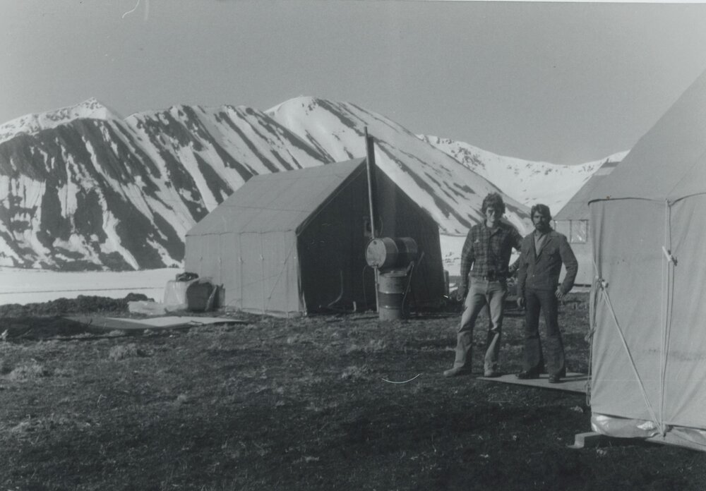 Dr. Abdulla (right) with a camp colleague outside a tent at the Canex Placer camp, summer 1973