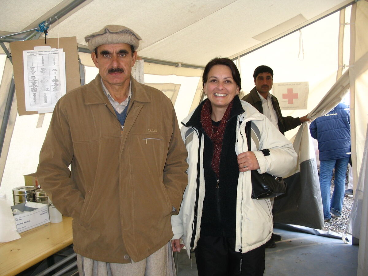 Monique Tremblay with a local guide in a Red Cross tent