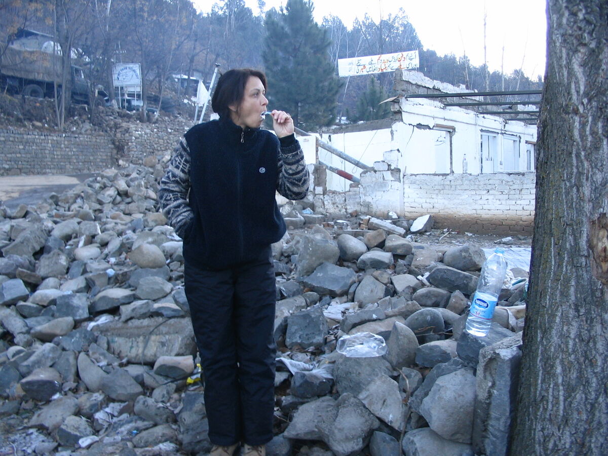 Monique Tremblay amid the rubble of the destroyed base