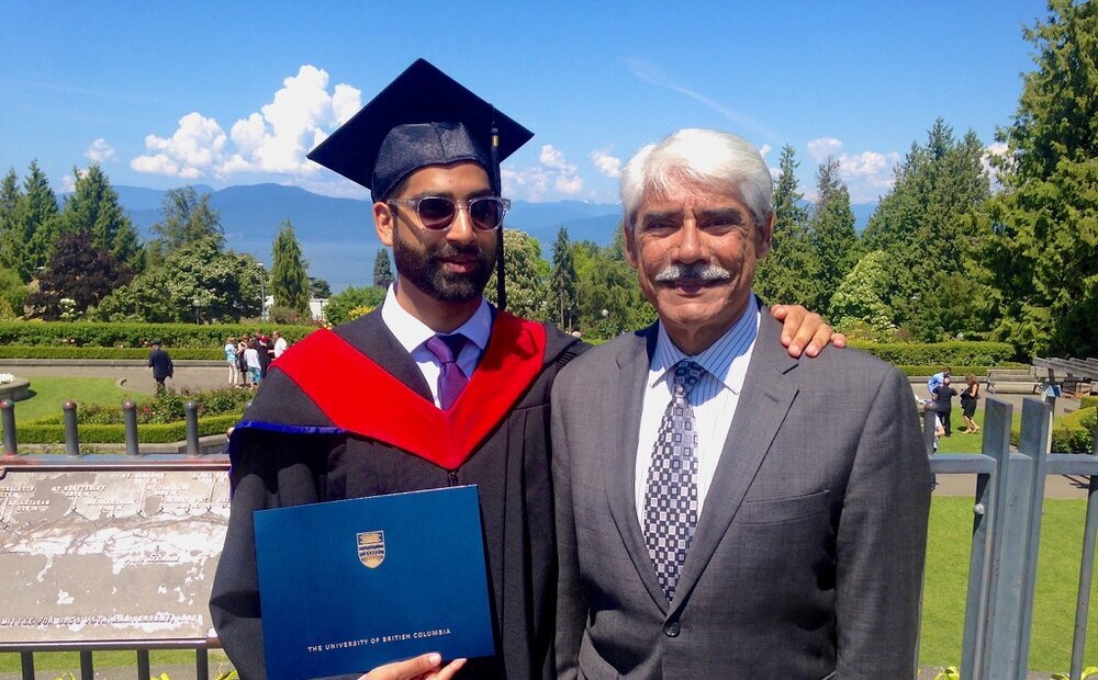 Dr. Abdulla with his son Alym at Alym's UBC Medicine graduation, 2015